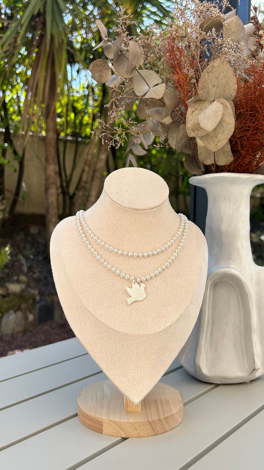 Wings of Grace: Pearl Necklace with Mother-of-Pearl Bird Pendant